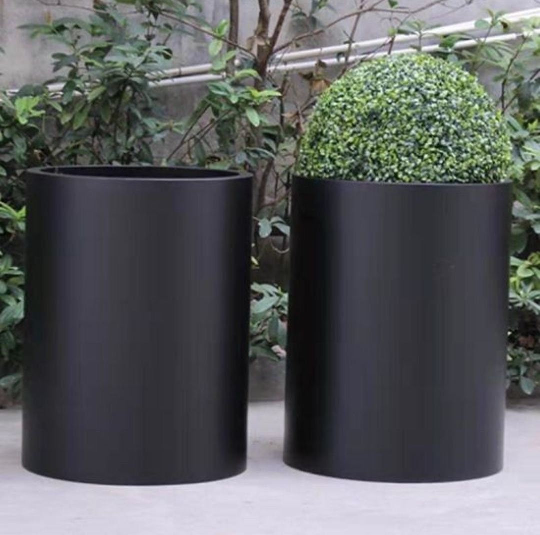 Modern sleek Cylender style planter