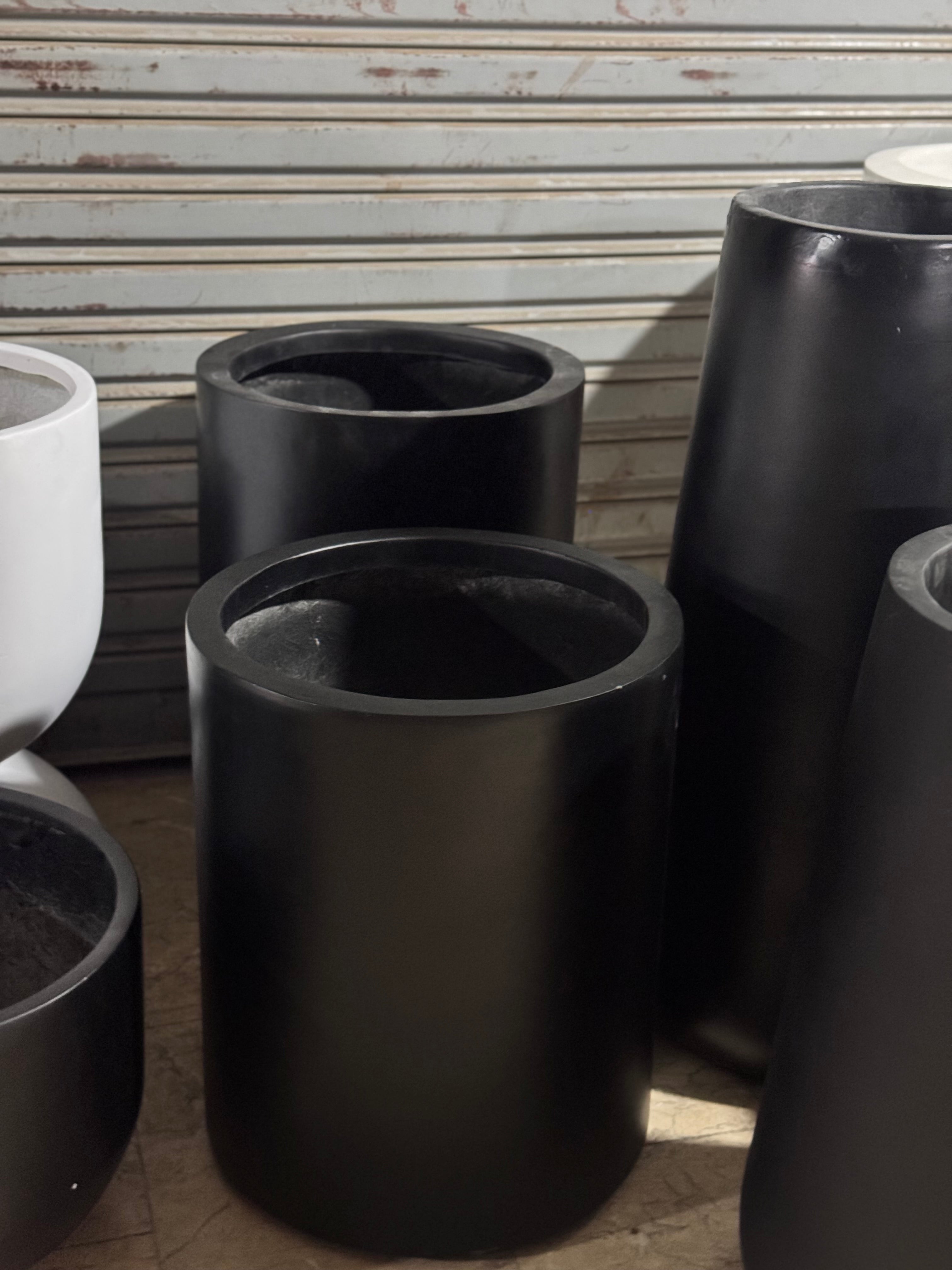 Modern sleek Cylender style planter