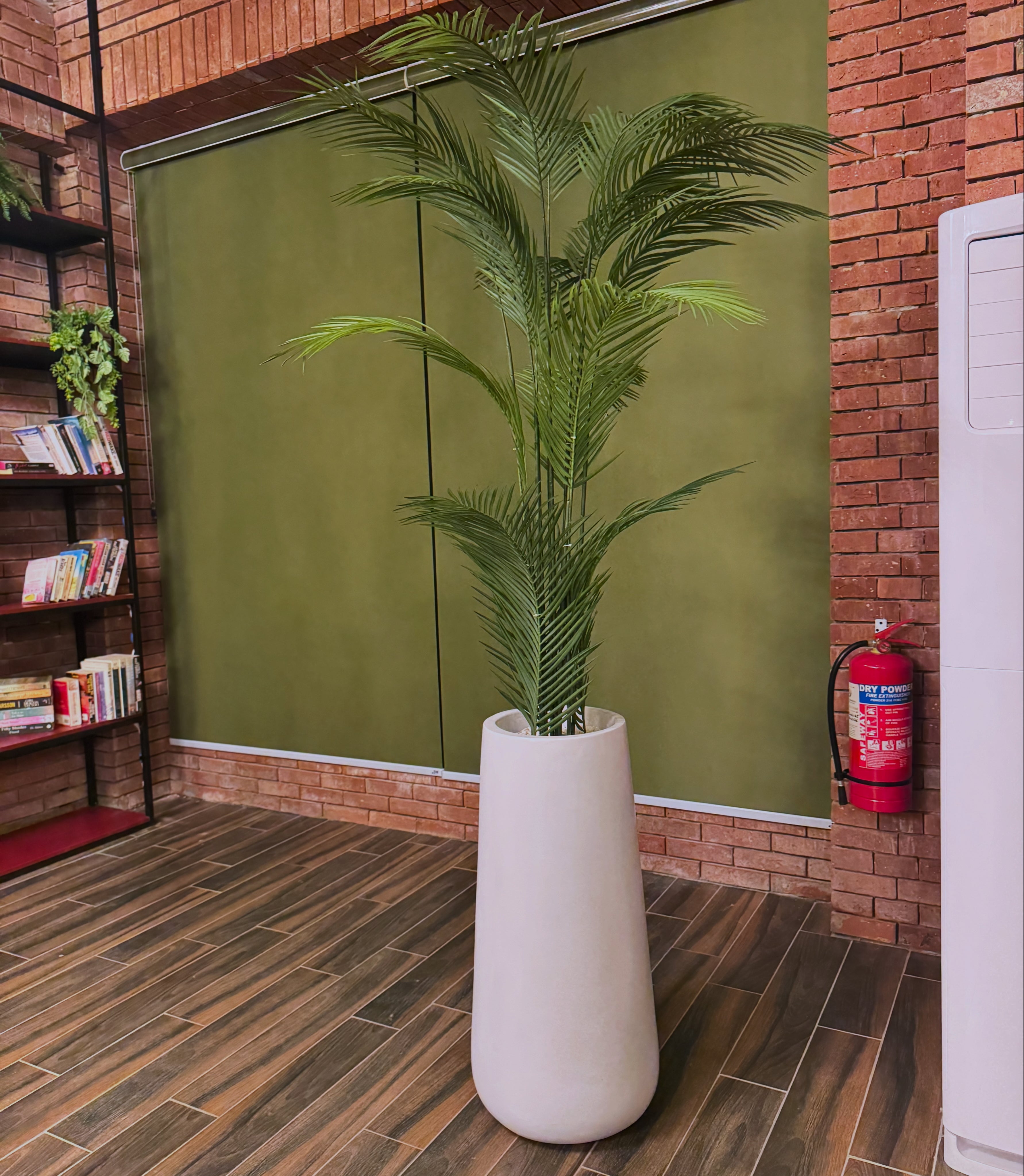 Sleek palm with signature fiberglass planter