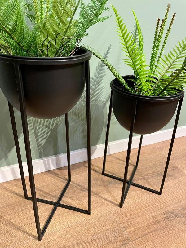 Century style metal stand with pot