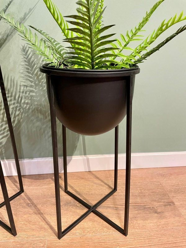 Century style metal stand with pot